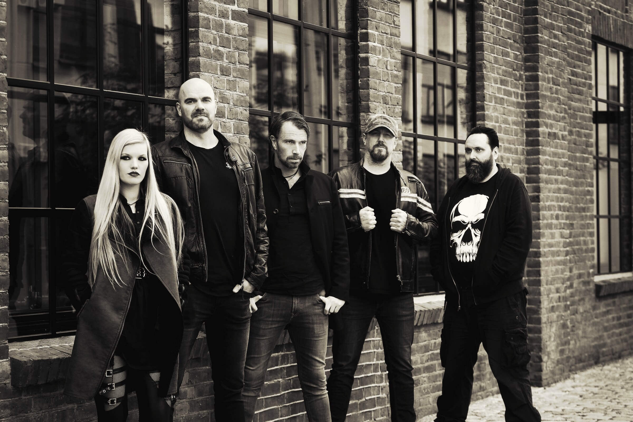 Black and white band portrait on a Bergen brick backstreet. Photo: Agnieszka Iwanska / AGA Visuals